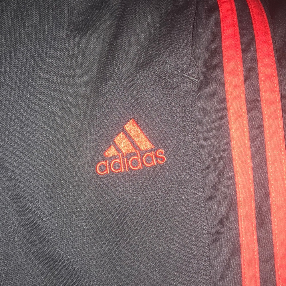 Dark slate grey and red adidas jogger pants